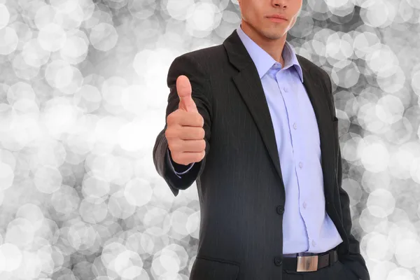 Business man posing over abstract background — Stock Photo, Image