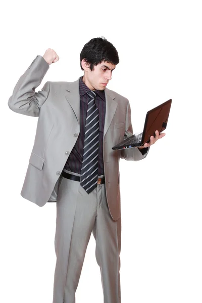 Ο άνθρωπος των επιχειρήσεων εμφανίζει ένα φορητό υπολογιστή — Φωτογραφία Αρχείου