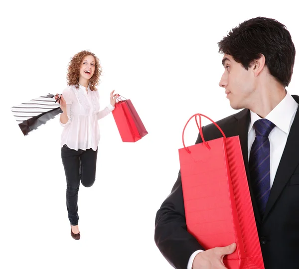 Couple with shopping bags Royalty Free Stock Images