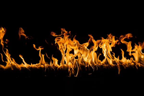 Blazing flames on black background — Stock Photo, Image