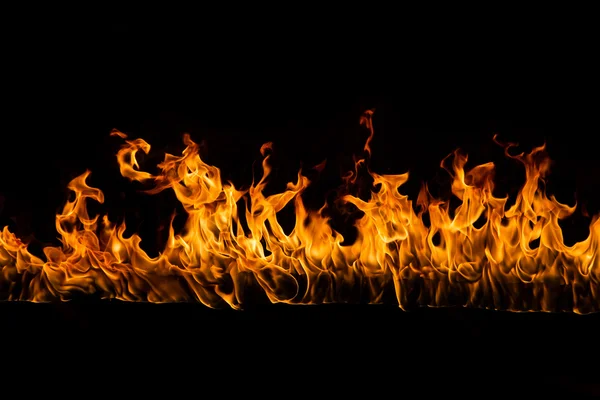 Blazing flames on black background — Stock Photo, Image