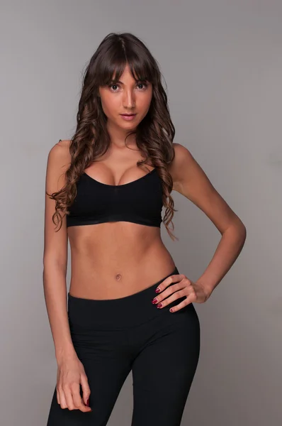 Beautiful healthy fitness woman posing — Stock Photo, Image