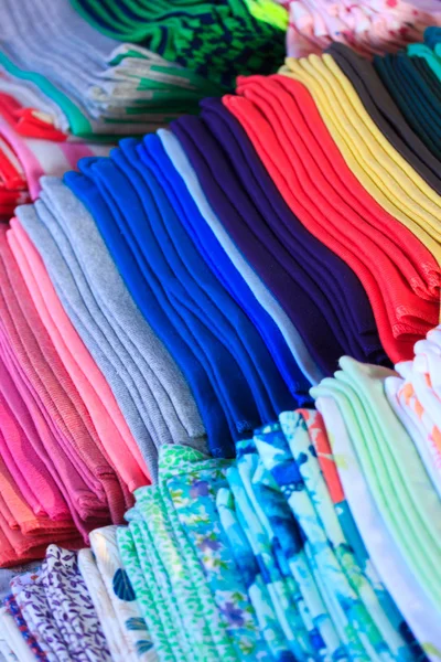 Close up of a pile of tshirts — Stock Photo, Image