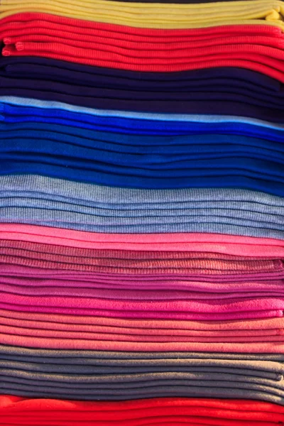 Close up of a pile of tshirts — Stock Photo, Image