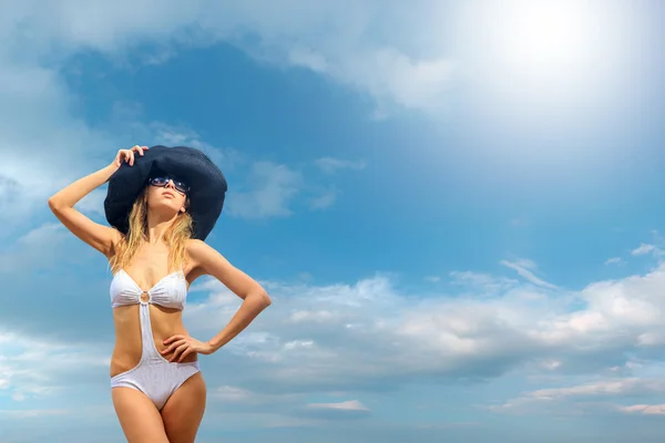 Bikini model over sky background — Stock Photo, Image