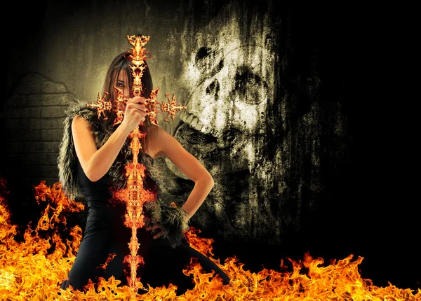 kafatası ile ateş kılıç tutan savaşçı kadın