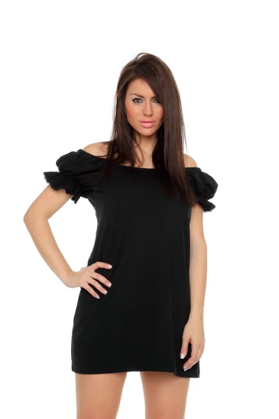 Vrij sexy meisje poseren in een mooie zwarte jurk — Stockfoto