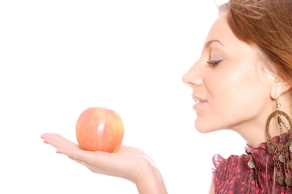 A pretty young woman holding an apple — Stock Photo, Image