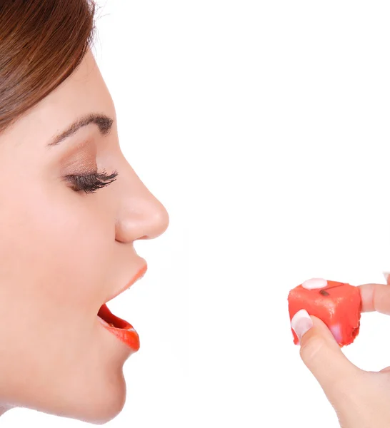 Mujer atractiva con un pastel — Foto de Stock