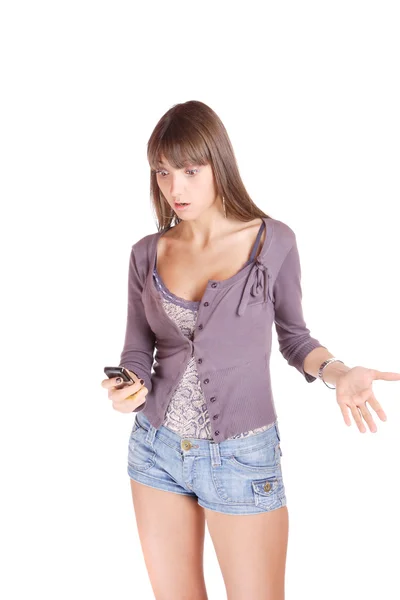 Eine attraktive junge Frau mit Handy — Stockfoto