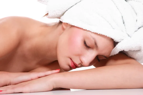 Woman under towels Stock Photo