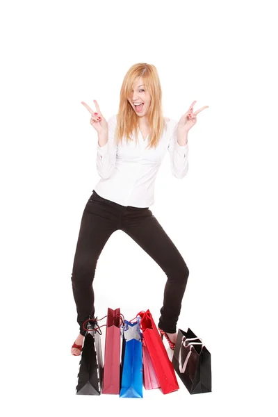 Femme heureuse avec des sacs à provisions — Photo