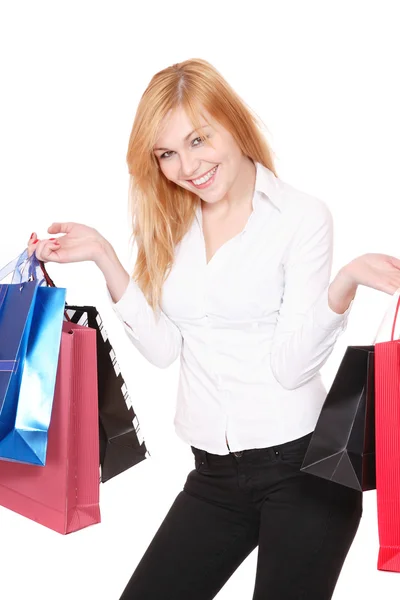 Mulher feliz com sacos de compras — Fotografia de Stock