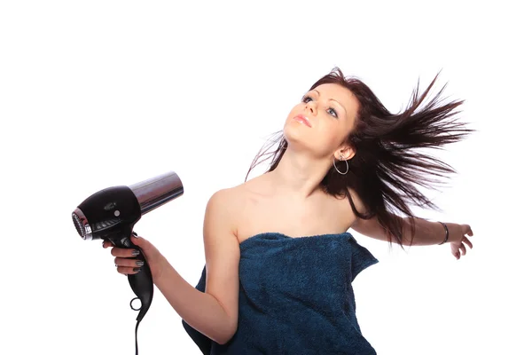 Mulher com penteado moda segurando secador de cabelo — Fotografia de Stock