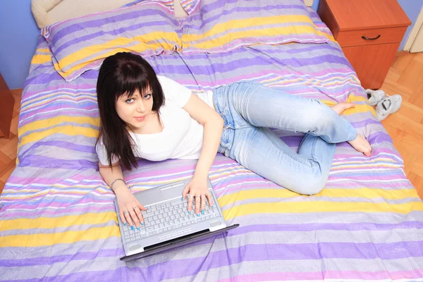 Teen girl in bed — Stock Photo, Image