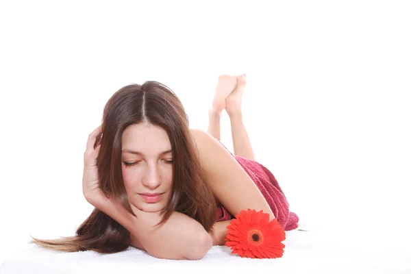 Schöne Frau mit Blume — Stockfoto