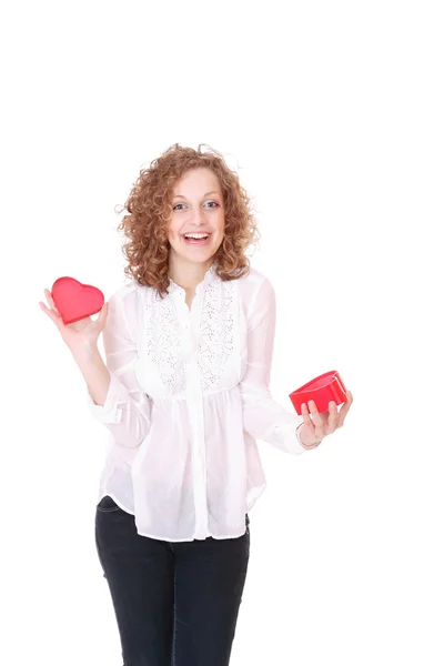 Woman with a heart gift in her hands — Stock Photo, Image