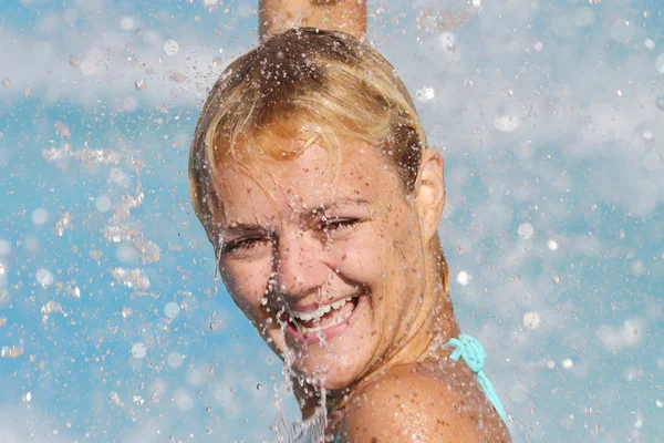 Beautiful young woman at a pool — Stock Photo, Image