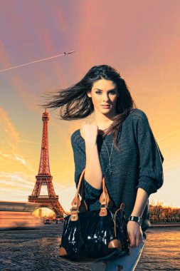 Woman visiting Paris in France with the Eiffel tower clipart