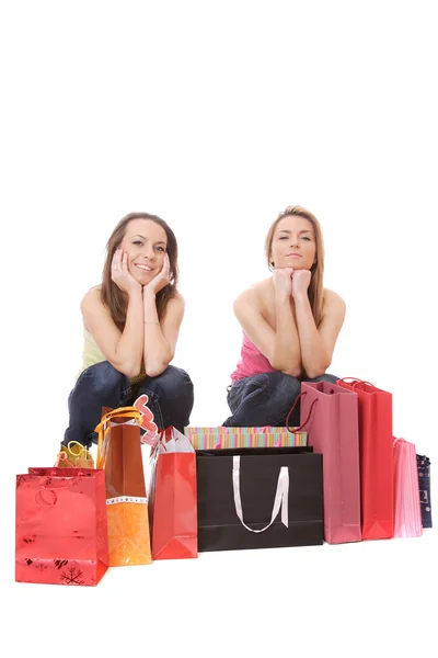 Geïsoleerde twee winkelen vrouwen — Stockfoto