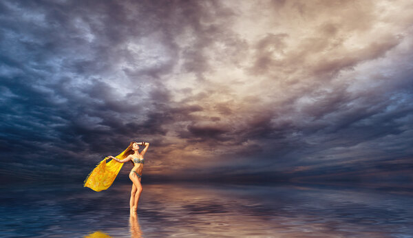 Woman with sarong walking on water