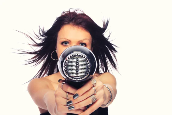 Woman with fashion hairstyle holding hairdryer — Stock Photo, Image