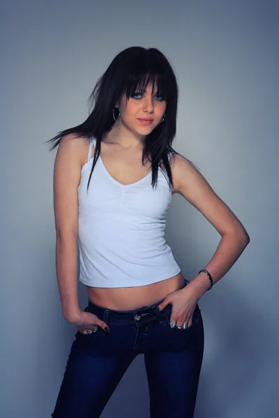 Young woman in jeans and t shirt — Stock Photo, Image