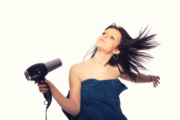 Жінка з модною зачіскою тримає фен — стокове фото
