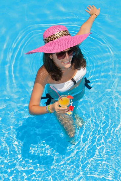 Young woman in the swimming pool — Stock Photo, Image