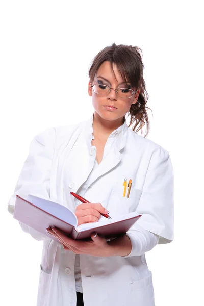 Female doctor holding a notebook — Stock Photo, Image