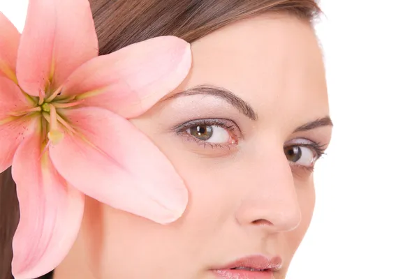 Beautiful woman with flower isolated on white — Stock Photo, Image