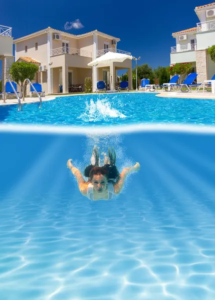 Woman diving underwater — Stock Photo, Image