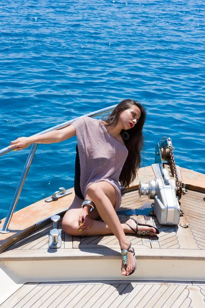 Young woman on her private yacht — Stock Photo, Image