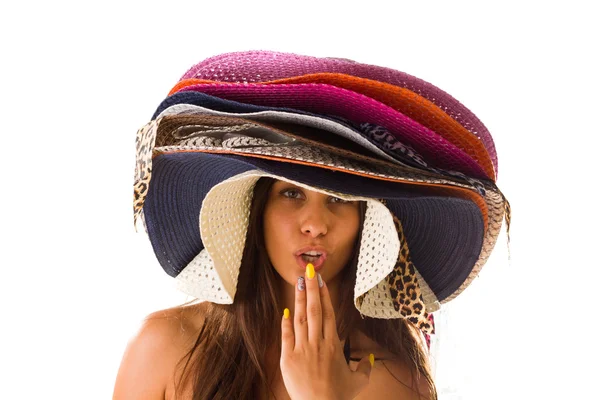 Woman with many summer beach hats — Stock Photo, Image
