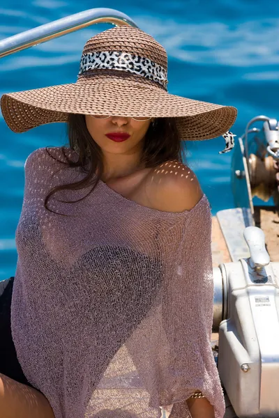 Young woman on her private yacht — Stock Photo, Image