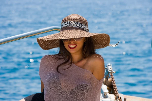 Young woman on her private yacht — Stock Photo, Image