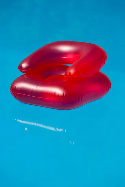 Couch in the swimming pool — Stock Photo, Image