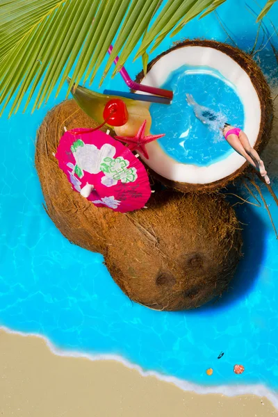Woman in Coconut cocktail swimming pool — Stock Photo, Image