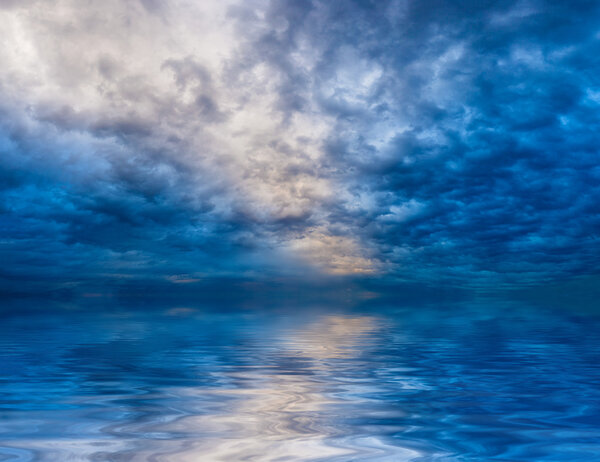 Skyscape with water reflections