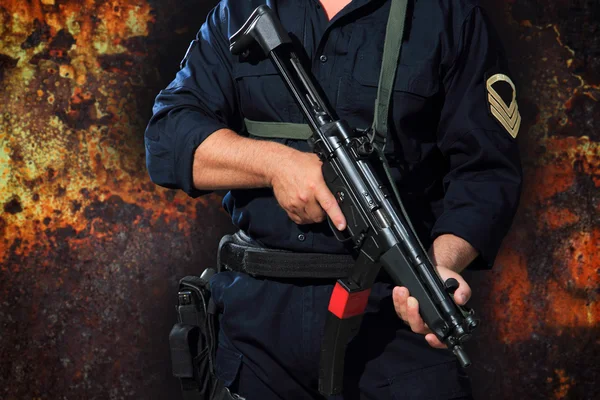 Special tactics man holding a weapon — Stock Photo, Image