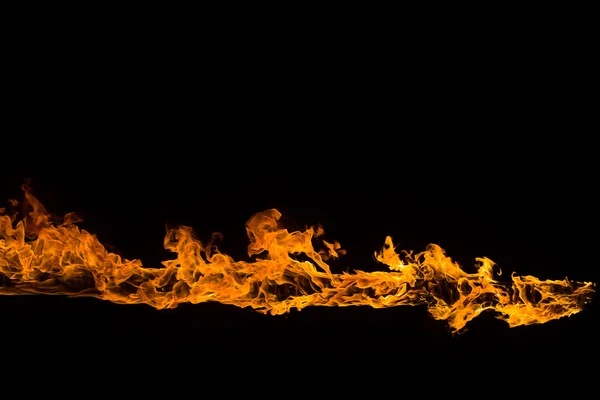 Палаюче полум'я на чорному тлі — стокове фото