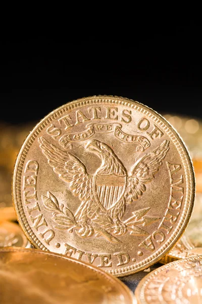 П'ять доларів золоті монети — стокове фото