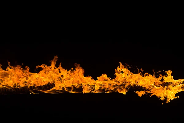 Blazing flames on black background — Stock Photo, Image