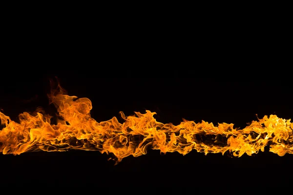 Blazing flames on black background — Stock Photo, Image