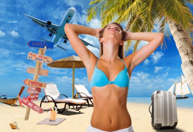 Kumsaldaki genç kadın.