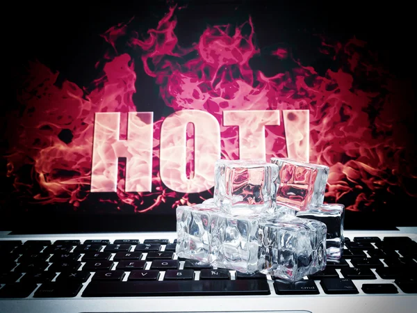 Ice cubes on computer keyboard — Stock Photo, Image