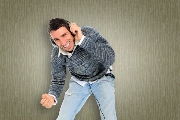 Man listens music with headphones — Stock Photo, Image