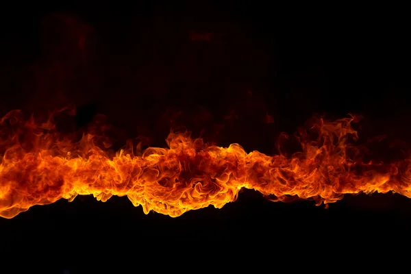 Blazing flames on black background — Stock Photo, Image