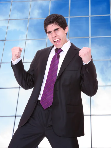 Business man posing at corporate building — Stock Photo, Image