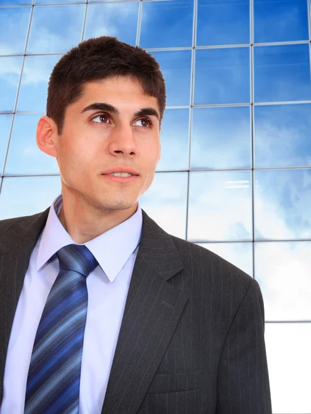 Business man posing at corporate building — Stock Photo, Image
